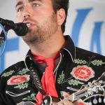 Taylor Malpass with The Malpass Brothers at the 2016 Delaware Valley Bluegrass Festival - photo by Frank Baker