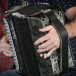 Sean McComiskey's button accordion onstage with Charm City Junction at the 2016 Delaware Valley Bluegrass Festival - photo by Frank Baker