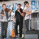 Bryan McDowell, Mark Schatz, and Jarod Walker with The Claire Lynch Band at the 2016 Delaware Valley Bluegrass Festival - photo by Frank Baker