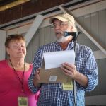 Katy Daley and Bill Foster serves as MC at the 2016 Delaware Valley Bluegrass Festival - photo by Frank Baker