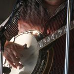 Rickie Simpkins with Seldom Scene at the 2016 Delaware Valley Bluegrass Festival - photo by Frank Baker