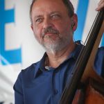 Ronnie Simpkins with Seldom Scene at the 2016 Delaware Valley Bluegrass Festival - photo by Frank Baker