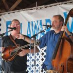 Lou Reid and Ronnie Simpkins with Seldom Scene at the 2016 Delaware Valley Bluegrass Festival - photo by Frank Baker