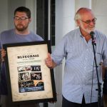 Festival promoter Davis Tracy at a 20th Anniversary presentation at the 2015 Bluegrass on the Grass Festival - photo by Frank Baker-rg