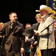Dan Boner presents Doyle Lawson with a new Stetson hat at the ETSU event at the Paramount Theatre - photo by Sherri George, publicist for Doyle Lawson & Quicksilver