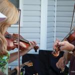 Rhonda Vincent twins with Steve Day at the party held Lance LeRoy's honor - photo © Dreama Stephenson Photography