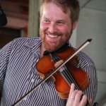Adam Haynes with The Grascals at the 2014 Delaware Valley Bluegrass Festival - photo by Frank Baker