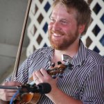 Adam Haynes with The Grascals at the 2014 Delaware Valley Bluegrass Festival - photo by Frank Baker