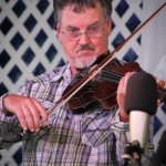 Mike Hartgrove with Lonesome River Band at the 2014 Delaware Valley Bluegrass Festival - photo by Frank Baker