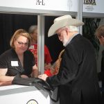 Doyle Lawson registering at World of Bluegrass 2016 - photo by Frank Baker