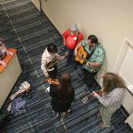 Geoff Scoggins & Colorado in the ever-present hallway jam at World of Bluegrass 2016 - photo by Frank Baker