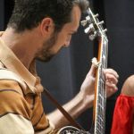 Kyle Tuttle with Jenni Lyn Gardner on the Masters Stage at World of Bluegrass 2016 - photo by Frank Baker