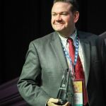 Joe Mullins with his 2016 Broadcaster of the Year Award at World of Bluegrass 2016 - photo by Frank Baker Union