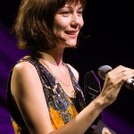 Molly Tuttle accepts her Momentum Award at World of Bluegrass 2016 - photo by Frank Baker