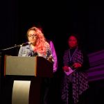Melody Walker accepts her Momentum Award at World of Bluegrass 2016 - photo by Frank Baker