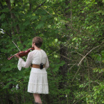 Ainsley Porchak with the ETSU Pride Band warming up at the May 2016 Gettysburg Bluegrass Festival - photo by Frank Baker