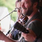 Nicky Sanders and Graham Sharp with Steep Canyon Rangers at the Gettysburg Bluegrass Festival (August 2014) - photo by Frank Baker
