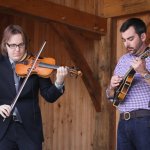 Nicky Sanders and Mike Guggino with Steep Canyon Rangers at the Gettysburg Bluegrass Festival (August 2014) - photo by Frank Baker