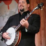Aaron McDaris with Rhonda Vincent at the Gettysburg Bluegrass Festival (August 2014) - photo by Frank Baker