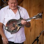 Lou Reid with Seldom Scene playing John Duffey\'s old mandolin at the Gettysburg Bluegrass Festival (August 2014) - photo by Frank Baker