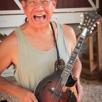 Akira Otsuka with John Duffey's old mandolin at the Gettysburg Bluegrass Festival (August 2014) - photo by Frank Baker