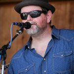 Don Rigsby singing with Seldom Scene at the August Gettysburg Bluegrass Festival - photo by Frank Baker