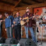 Don Rigsby and James King singing with Seldom Scene at the August Gettysburg Bluegrass Festival - photo by Frank Baker