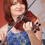 Tammy Rogers with The Steeldrivers at the August 2013 Gettysburg Bluegrass Festival - photo by Frank Baker