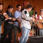 Travelin' McCourys with Bill Nershi at the August 2013 Gettysburg Bluegrass Festival - photo by Frank Baker