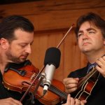 Jason Carter and Ronnie McCoury with Travelin' McCourys at the August 2013 Gettysburg Bluegrass Festival - photo by Frank Baker