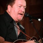 Lou Reid with Seldom Scene at the August 2013 Gettysburg Bluegrass Festival - photo by Frank Baker