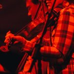 Jeremy Garret with Infamous Stringdusters at Grand Targhee 2012 - photo by Jason Lombard