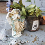 Figurines flanking Charles Haney's front porch in Reidsville, NC - photo by Becky Johnson