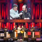 John Driskell Hopkins talking with Bill Anderson the Opry with Balsam Range (3/8/13) - © Grand Ole Opry, photo by Chris Hollo