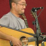 Shin Ichikawa at the Bourgeois Flatpicking Jam at World of Bluegrass 2012 - photo by Woody Edwards