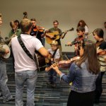The Meyers jam at the IBMA Youth Room at World of Bluegrass 2013 - photo by Tara Linhardt