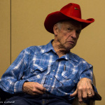 Al Hawkes shares a tale at the 2016 Joe Val Bluegrass Festival - photo © Tara Linhardt