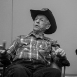Al Hawkes shares a tale at the 2016 Joe Val Bluegrass Festival - photo © Tara Linhardt