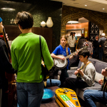 Young pickers jamming in the lobby at the 2016 Joe Val Bluegrass Festival - photo © Tara Linhardt