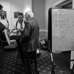 Stan Zdonik chats with Flatt Lonesome at the 2016 Joe Val Bluegrass Festival - photo © Tara Linhardt