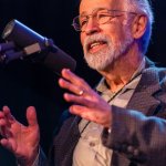 Roland White accepts Heritage Award for The White Brothers at the 2015 Joe Val Bluegrass Festival - photo by David Hollender