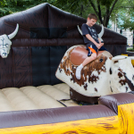 Bull riding for kids at Wide Open Bluegrass 2016 - photo © Tara Linhardt