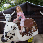 Bull riding for kids at Wide Open Bluegrass 2016 - photo © Tara Linhardt