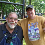 Johnny Ridge and an avid bluegrass fan at Lil John Bluegrass Festival - photo © 2012 by Laura Tate Photography