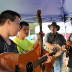 Tyler Jackson, Caleb Hagwood (Bethesda Bluegrass Band), Jake Burrows (Burrows Brothers), Connor Hagwood (Bethesda Bluegrass Band) at Lil John Bluegrass Festival - photo © 2012 by Laura Tate Photography
