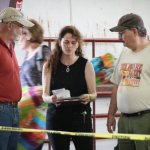 Festival organizer Tara Linhardt going over contest rules at the 2014 Loudoun Bluegrass Festival - photo by Frank Baker