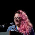 Melody Walker accepts her Vocalist Momentum Awards at the 2016 World of Bluegrass convention - photo © Tara Linhardt