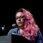 Melody Walker accepts her Vocalist Momentum Awards at the 2016 World of Bluegrass convention - photo © Tara Linhardt