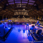 MC Dennis Jones takes the stage to begin the 2015 Mountain Song Festival - photo by Shelly Swanger