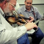 Johnny Ridge playing fiddle at the South Carolina State Bluegrass Festival (11/23/12) - photo by Laura Tate Photography